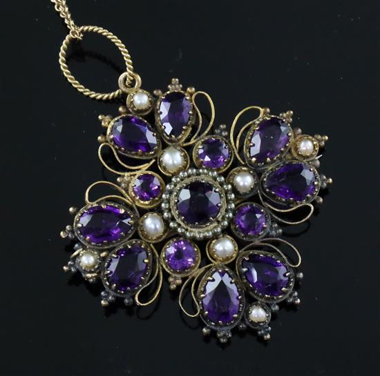 A Victorian gold, amethyst and split pearl set quatrefoil pendant, pendant 42mm.